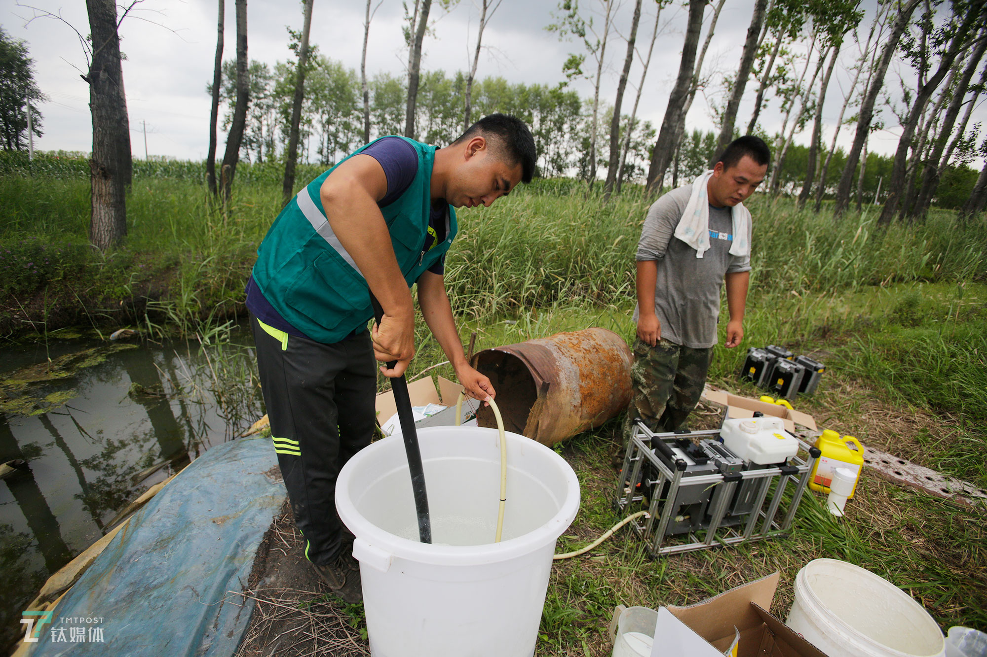 The new farmers with spraying drones in China's northeast farm land Beidahuang        