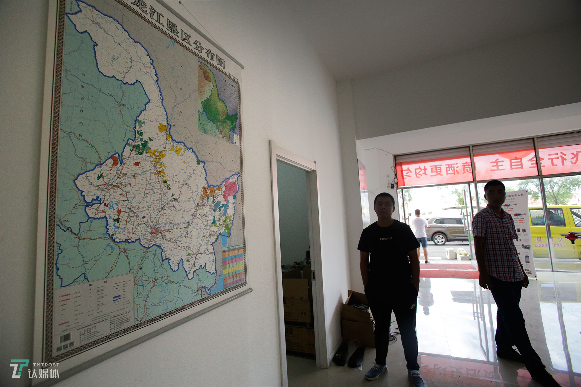 The new farmers with spraying drones in China's northeast farm land Beidahuang        