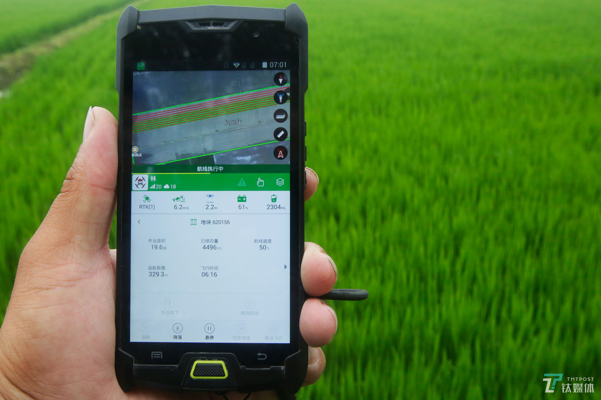 The new farmers with spraying drones in China's northeast farm land Beidahuang        