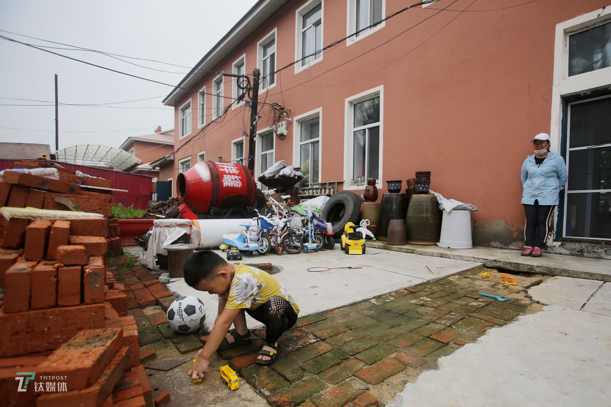 The new farmers with spraying drones in China's northeast farm land Beidahuang        