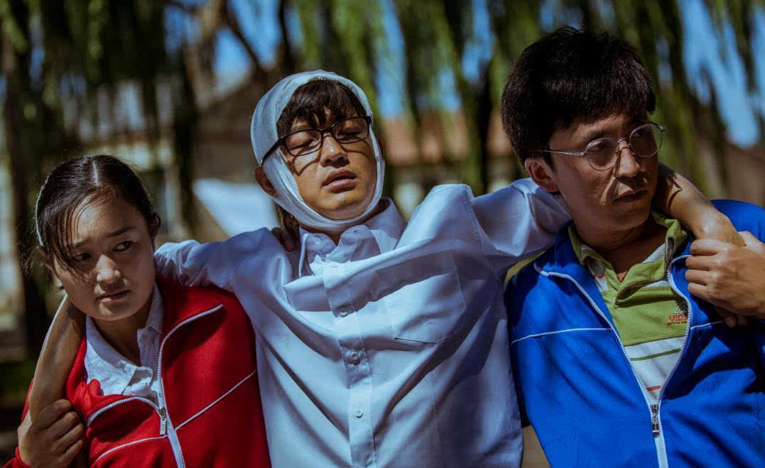 返乡|春节档电影“得小镇青年得天下”, 但他们已经不进电影院了