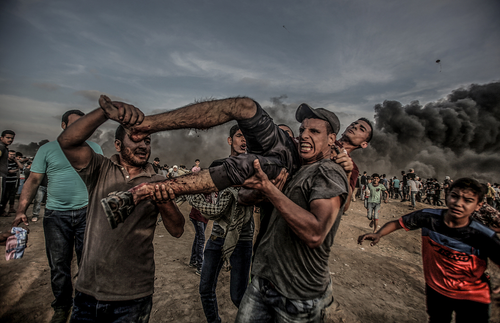 【钛媒体图集】世界奖金最高摄影大赛揭晓:镜头里的冲突,灾难,人性