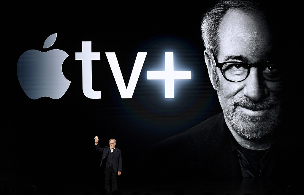 filmmaker steven spielberg waves while arriving on stage to