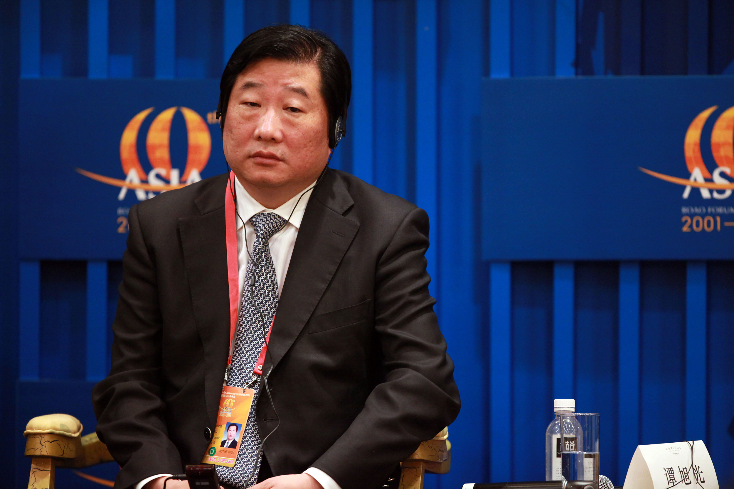 铁血国企掌门谭旭光的功与成