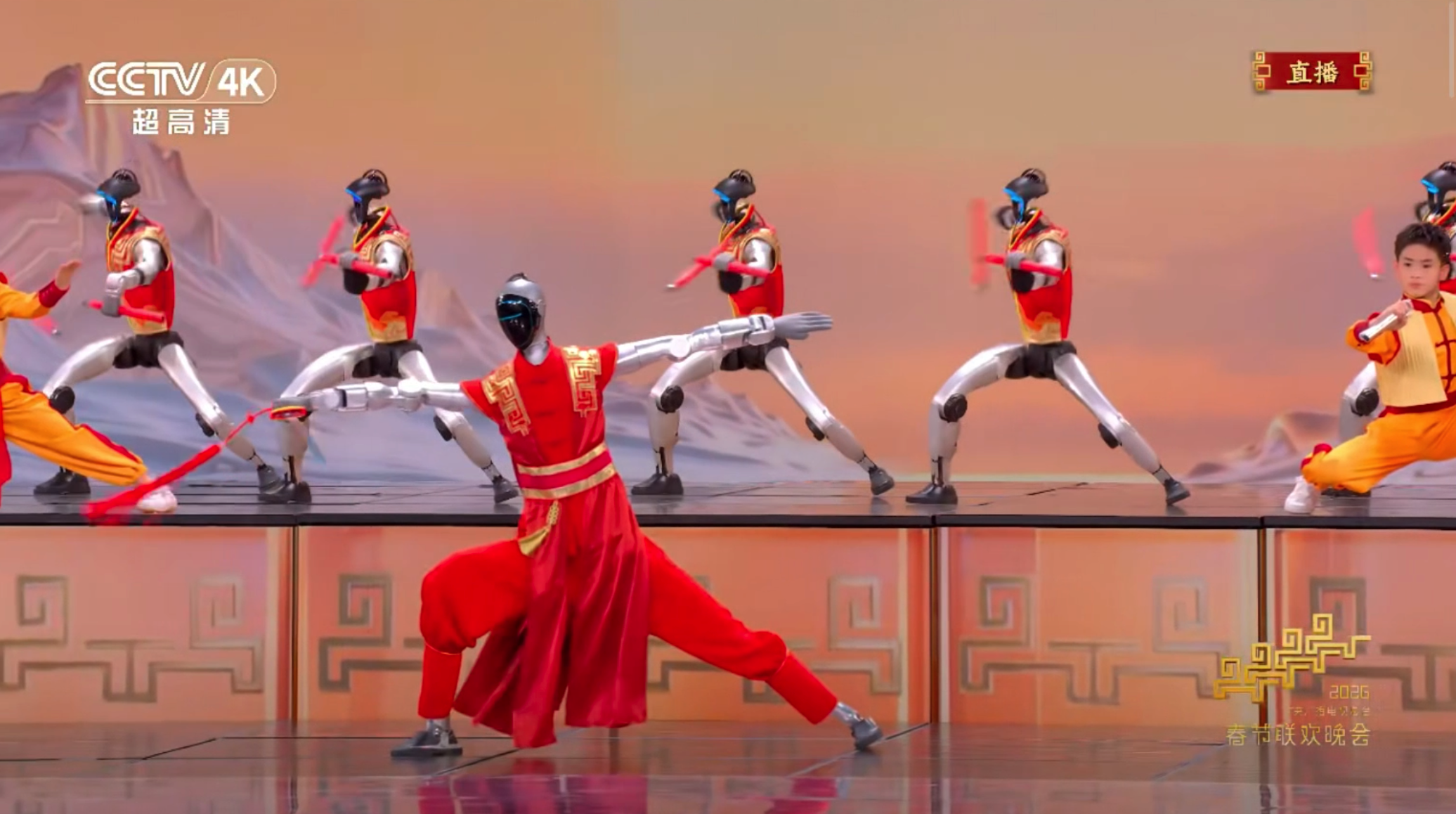 宇树翻上墙、银河夹烤肠：2026年春晚机器人哪家强？