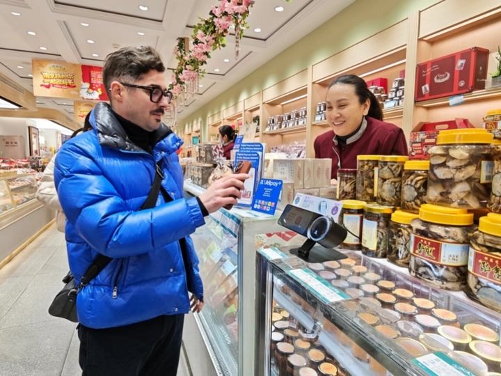 春节移动支付“双向奔赴”，来华扫码畅游，出境一码享惠