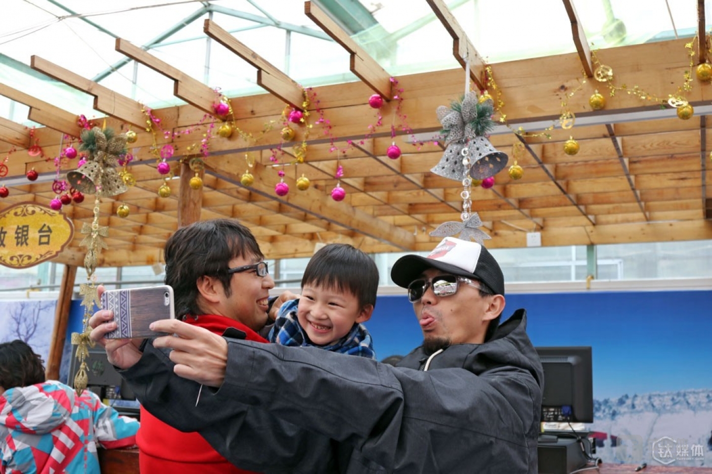 Mr. Ball was taking a picture with a kid who participated in that day&rsquo;s activity. The kid was bored with primary level skiing lanes and wanted to try skiing on higher-level lanes.