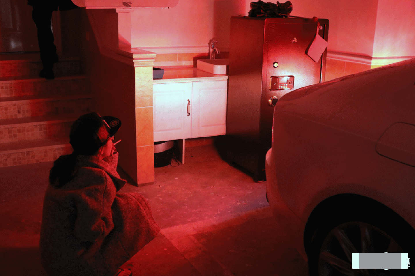 At the office in Qingpu, Xu began to smoke once she got off the car.